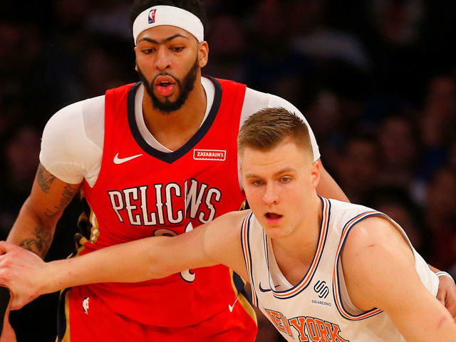 NEW YORK, NY - JANUARY 14: (NEW YORK DAILIES OUT) Kristaps Porzingis #6 of the New York Knicks in action against Anthony Davis #23 of the New Orleans Pelicans at Madison Square Garden on January 14, 2018 in New York City. The Pelicans defeated the Knicks 123-118 in overtime. NOTE TO USER: User expressly acknowledges and agrees that, by downloading and/or using this Photograph, user is consenting to the terms and conditions of the Getty Images License Agreement.