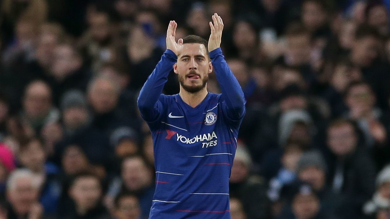 Chelsea's Belgian midfielder Eden Hazard applauds as he leaves the pitch substituted during the English Premier League football match between Chelsea and Huddersfield Town at Stamford Bridge in London on February 2, 2019.