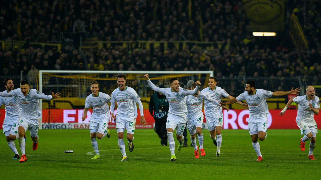 Bremen's Player celebrates after the German Cup (DFB Pokal) last 16 football match BVB Borussia Dortmund v Werder Bremen in Dortmund, western Germany on Februarz 5, 2019. - Dortmund lost the penalty shoot-out after extra-time to be knocked out of the competition.