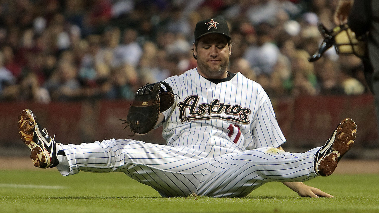 HOUSTON - JUNE 22: First baseman Lance Berkman #17 of the Houston Astros comes up short on his diving attempt on a foul ball against the San Francisco Giants at Minute Maid Park on June 22, 2010 in Houston, Texas.