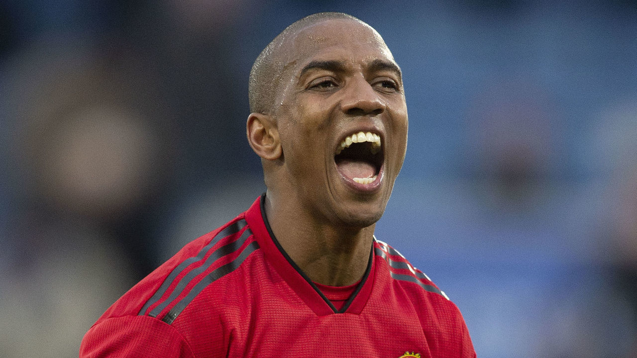 LEICESTER, ENGLAND - FEBRUARY 03: Ashley Young acknowledges the suppport of the travelling Manchester United fans during the Premier League match between Leicester City and Manchester United at The King Power Stadium on February 03, 2019 in Leicester, United Kingdom.