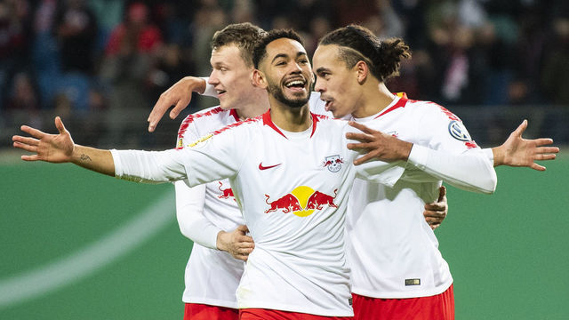 Leipzig´s Brazilian forward Matheus Cunha (C) celebrates scoring the first goal with his teammate Danish forward Yussuf Poulsen (R) and defender Lukas Klostermann during the German Cup (DFB Pokal) last 16 football match RB Leipzig v VfL Wolfsburg in Leipzig on February 6, 2019.