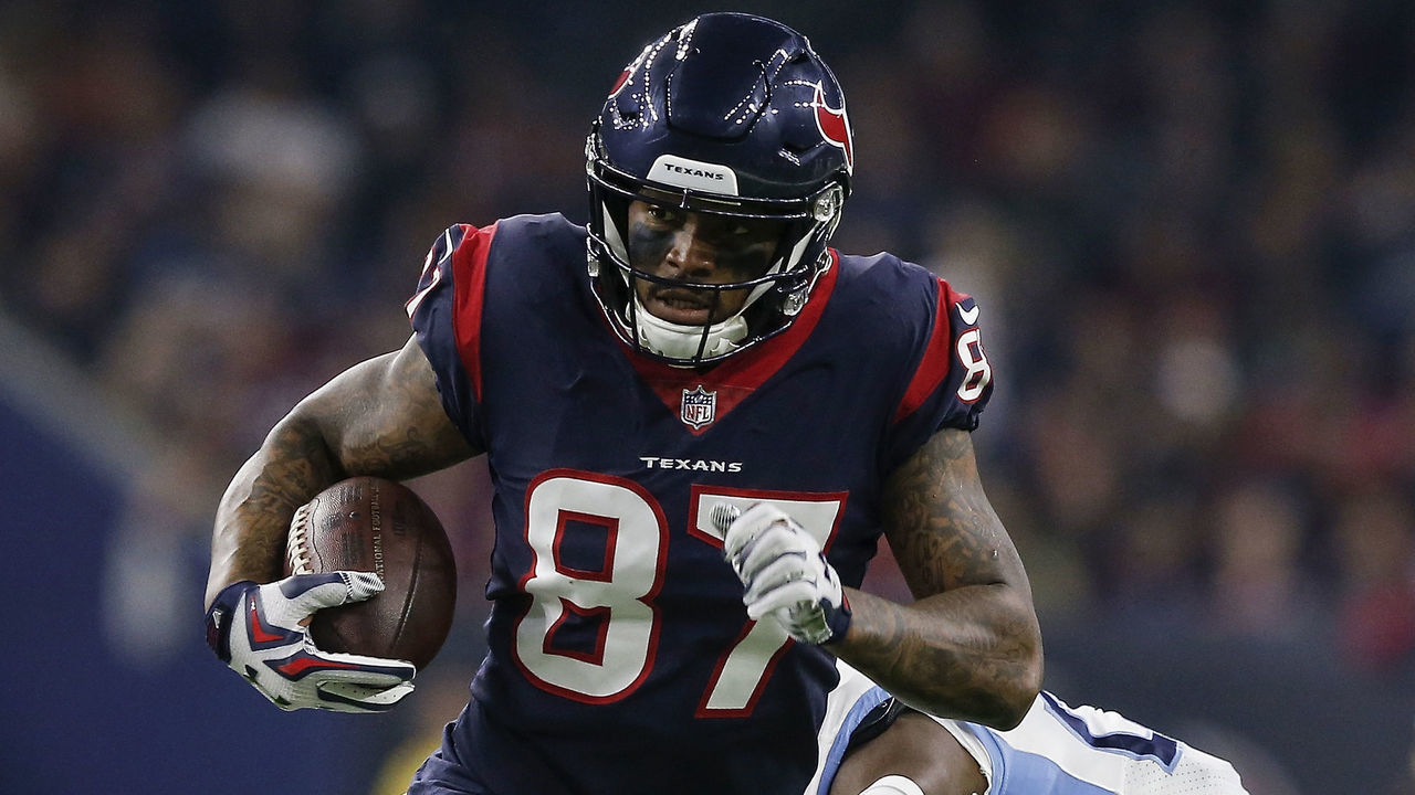 HOUSTON, TX - NOVEMBER 26: Demaryius Thomas #87 of the Houston Texans runs after a catch defended by Adoree' Jackson #25 of the Tennessee Titans in the first quarter at NRG Stadium on November 26, 2018 in Houston, Texas.