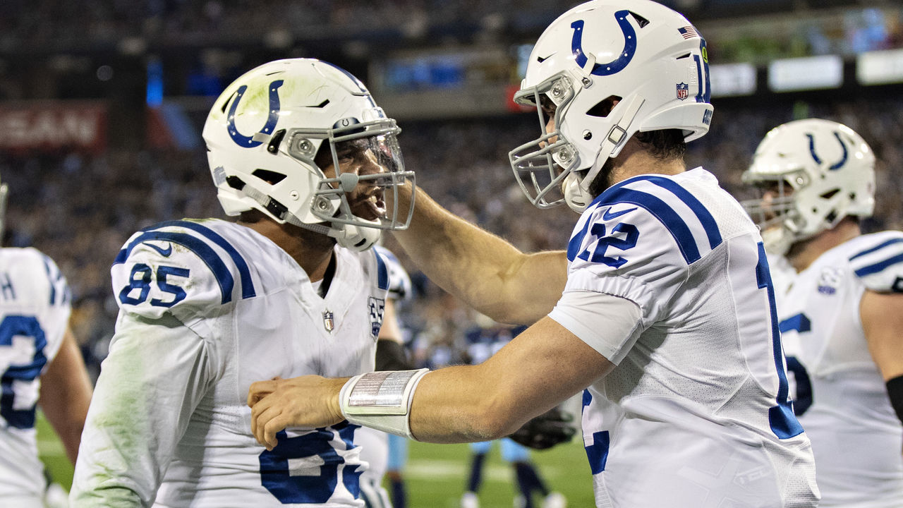 NASHVILLE, TN - DECEMBER 30: Andrew Luck #12 congratulates Eric Ebron #85 of the Indianapolis Colts after catching a pass for a touchdown during a game against the Tennessee Titans at Nissan Stadium on December 30, 2018 in Nashville, Tennessee. The Colts defeated the Titans 33-17.