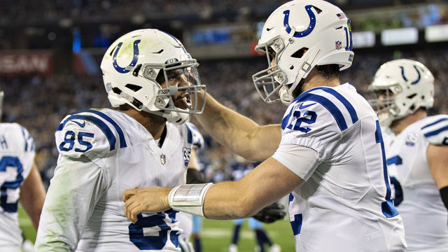 NASHVILLE, TN - DECEMBER 30: Andrew Luck #12 congratulates Eric Ebron #85 of the Indianapolis Colts after catching a pass for a touchdown during a game against the Tennessee Titans at Nissan Stadium on December 30, 2018 in Nashville, Tennessee. The Colts defeated the Titans 33-17.