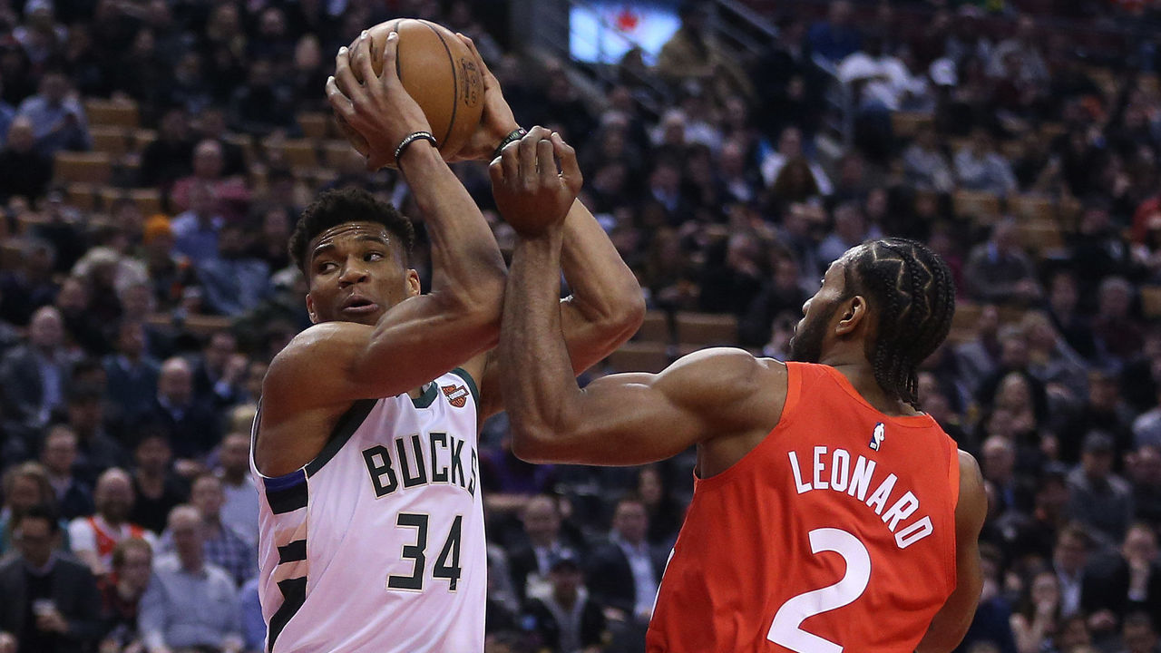TORONTO, ON- JANUARY 31 - Milwaukee Bucks forward Giannis Antetokounmpo (34) looks for an opening past Toronto Raptors forward Kawhi Leonard (2) as the Toronto Raptors play the Milwaukee Bucks at Scotiabank Arena in Toronto. January 31, 2019. (Steve Russell/Toronto Star via Getty Images)