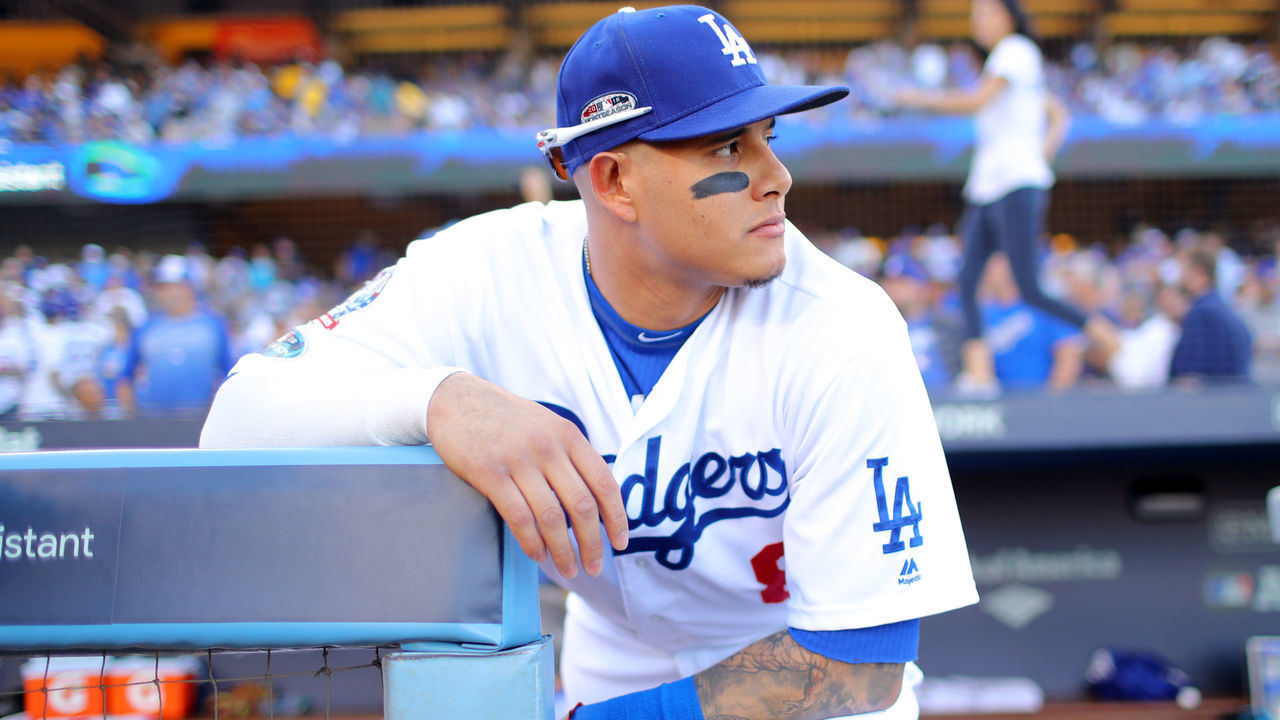 LOS ANGELES, CA - OCTOBER 15: Manny Machado #8 of the Los Angeles Dodgers is seen in the dugout before Game 3 of the NLCS against the Milwaukee Brewers at Dodger Stadium on Monday, October 15, 2018 in Los Angeles, California.