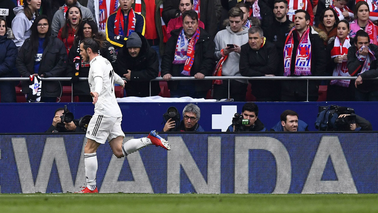 Real Madrid's Welsh forward Gareth Bale celebrates after scoring a goal during the Spanish league football match between Club Atletico de Madrid and Real Madrid CF at the Wanda Metropolitano stadium in Madrid on February 9, 2019.