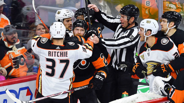 PHILADELPHIA, PA - FEBRUARY 09: Philadelphia Flyers center Claude Giroux (28) pokes his head up in the middle of the melee during the NHL hockey game between the Anaheim Ducks and the Philadelphia Flyers on February 09, 2019 at the Wells Fargo Center in Philadlephia PA.