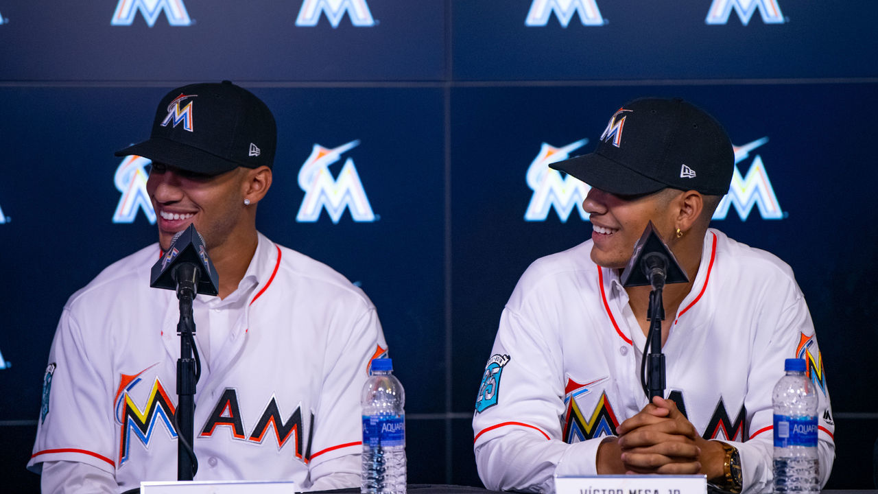 MIAMI, FL - OCTOBER 22: (L-R) Cuban baseball players Victor Victor Mesa, Victor Mesa Jr. meet with members of the media to announce the signing of the Mesa brothers at Marlins Park on October 22, 2018 in Miami, Florida.