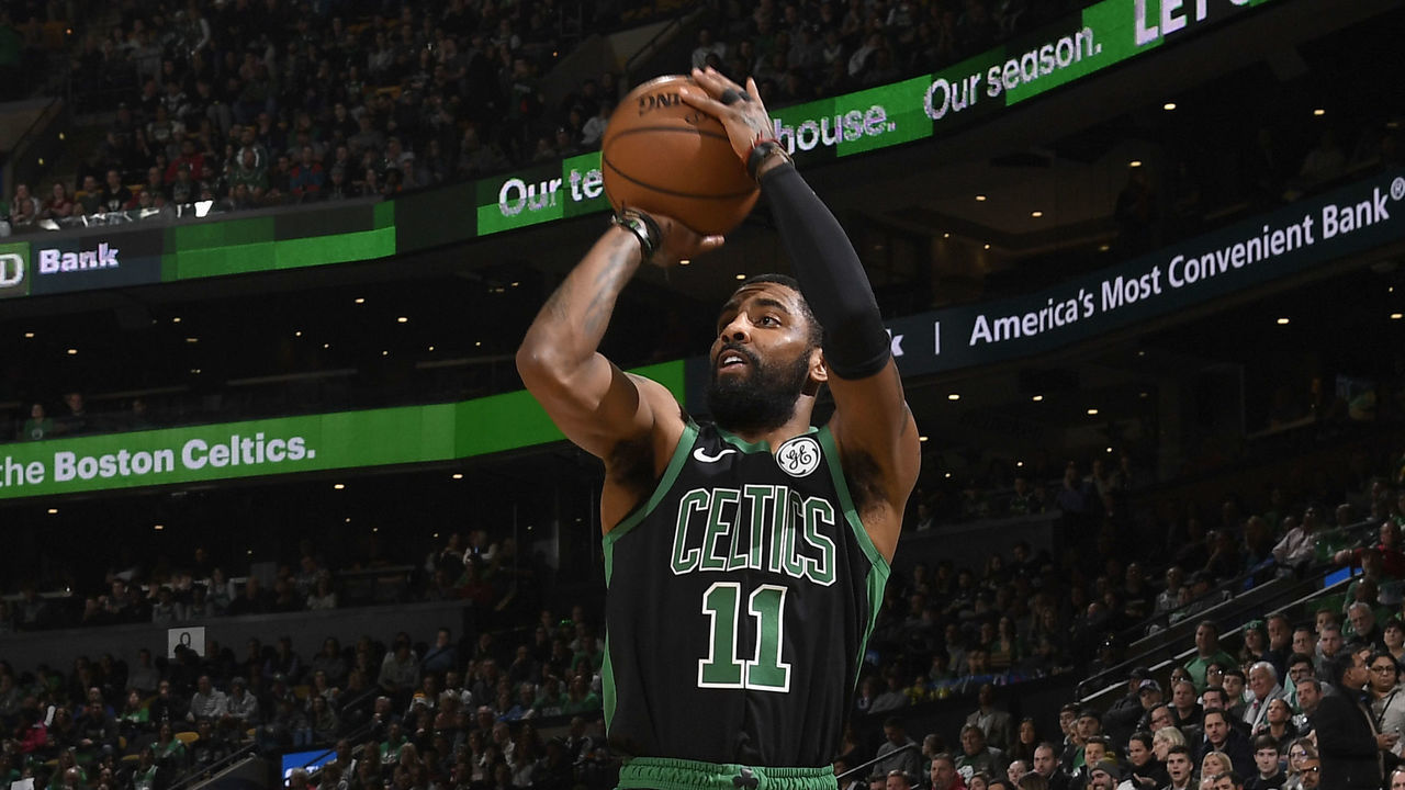 BOSTON, MA - FEBRUARY 9: Kyrie Irving #11 of the Boston Celtics shoots three point basket against the LA Clippers on February 9, 2019 at the TD Garden in Boston, Massachusetts. Mandatory Copyright Notice: Copyright 2019 NBAE
