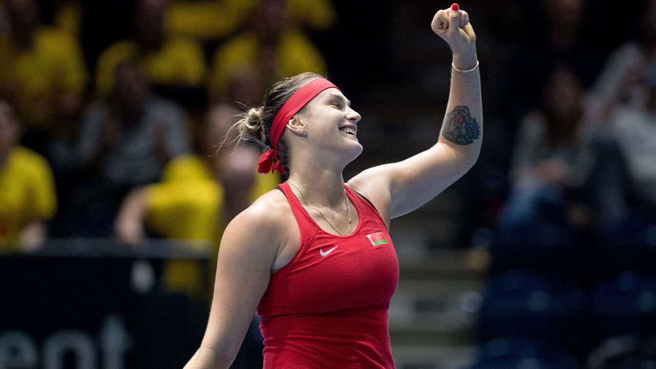 10 February 2019, Lower Saxony, Braunschweig: Tennis, ladies: Federation Cup - World Group, 1st round, Germany - Belarus: Belarusian Aryna Sabalenka is happy about her victory in the singles against Germany's Siegemund. Photo: Julian Stratenschulte/dpa