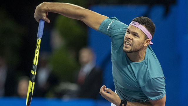 MONTPELLIER, FRANCE - February 10 Jo-Wilfried Tsonga of France in action against Pierre-Hughes Herbert of France in the Men's Final match during the Open Sud de France Tennis Tournament at the Sud de France Arena on February 10th 2019, Montpellier, France