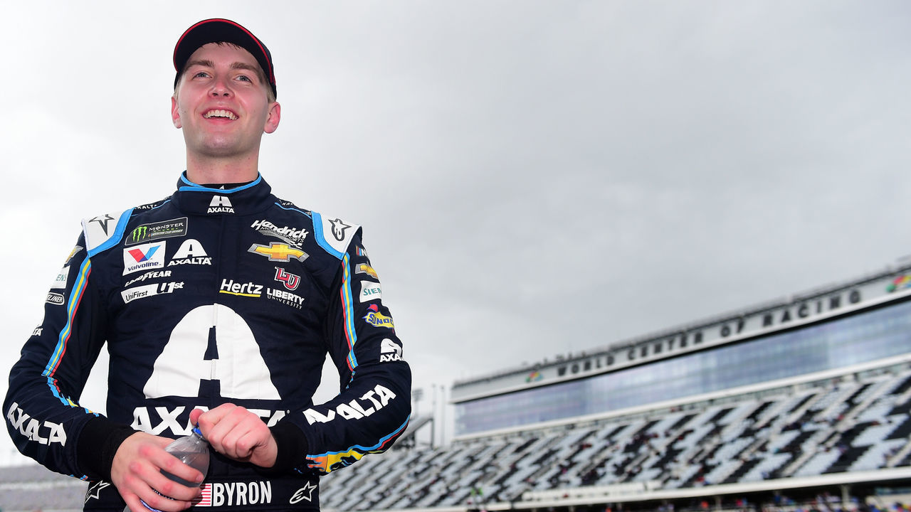 DAYTONA BEACH, FL - FEBRUARY 10: William Byron, driver of the #24 Axalta Chevrolet, stands on the grid during qualifying for the Monster Energy NASCAR Cup Series 61st Annual Daytona 500 at Daytona International Speedway on February 10, 2019 in Daytona Beach, Florida.