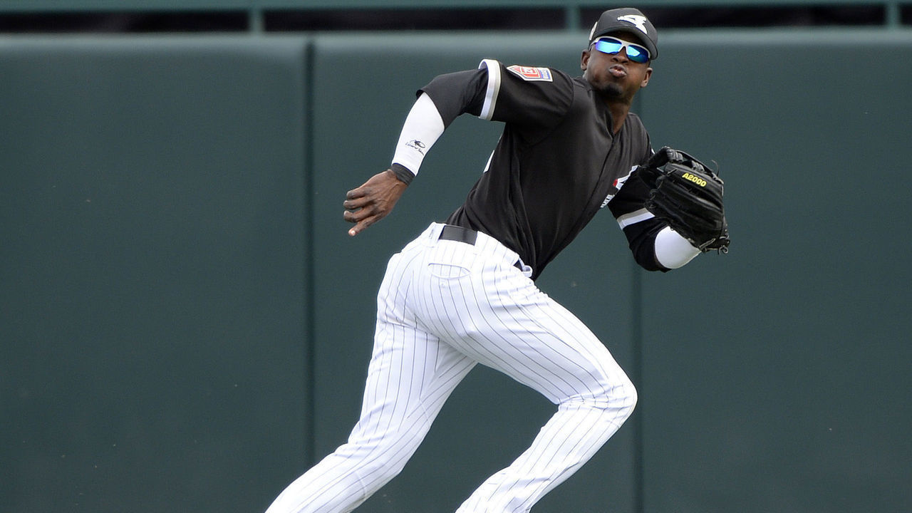 GLENDALE, ARIZONA - MARCH 07: Luis Robert #92 of the Chicago White Sox runs in the outfield against the Cincinnati Reds on March 7, 2018 at Camelback Ranch in Glendale Arizona.