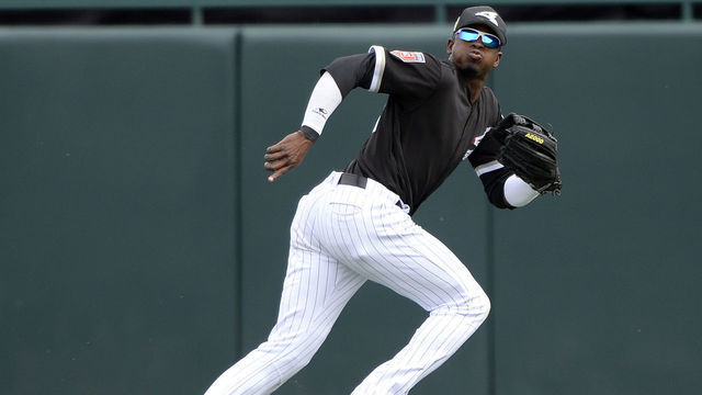 GLENDALE, ARIZONA - MARCH 07: Luis Robert #92 of the Chicago White Sox runs in the outfield against the Cincinnati Reds on March 7, 2018 at Camelback Ranch in Glendale Arizona.