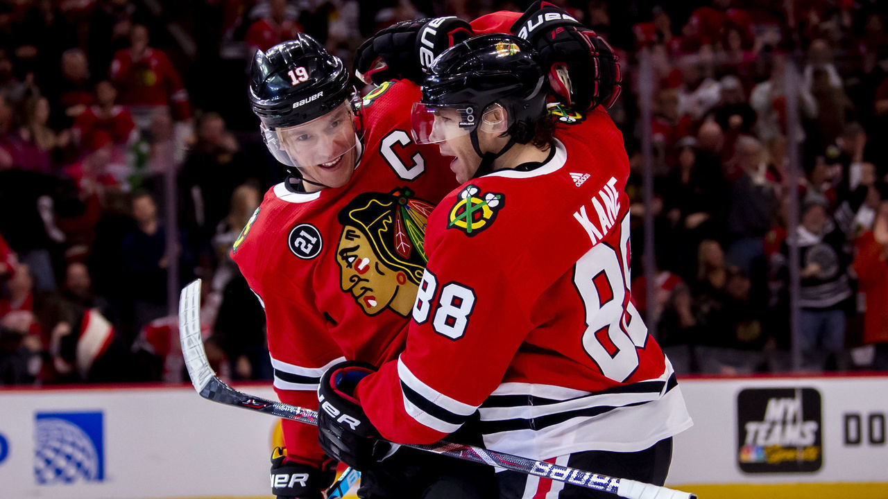 CHICAGO, IL - FEBRUARY 10: Chicago Blackhawks right wing Patrick Kane (88) celebrates his goal with center Jonathan Toews (19) during a game against the Detroit Red Wings on February 10, 2019, at the United Center in Chicago, IL.