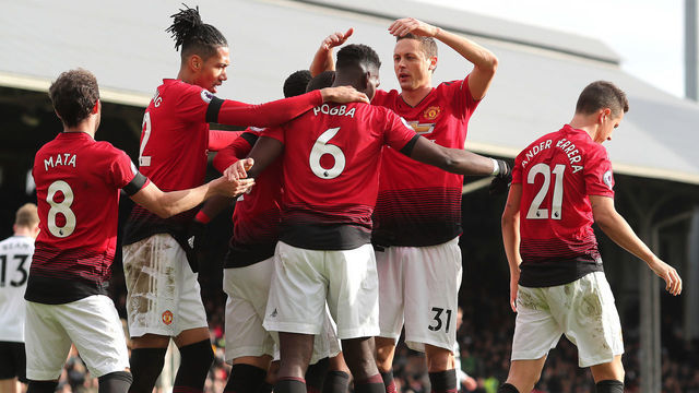LONDON, ENGLAND - FEBRUARY 09: Nemanja Matic of Man Utd celebrates by hugging goalscorer Paul Pogba after he scores a penalty during the Premier League match between Fulham FC and Manchester United at Craven Cottage on February 9, 2019 in London, United Kingdom.