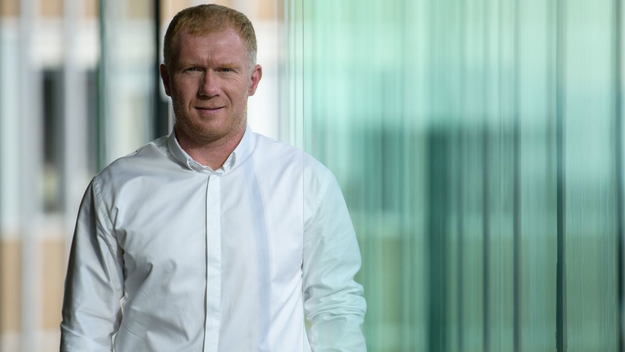 In this photo taken on August 8, 2018, former England and Manchester United football player Paul Scholes poses during an interview with AFP in Hong Kong. - Manchester United legend Paul Scholes has dismissed their chances of challenging for the Premier League title in the coming season, citing a gulf in quality between his former club and defending champions Manchester City. Scholes was in Hong Kong to promote 433 Token, a blockchain-based system that will allow football fans to connect with football stars and help sponsor young talent in the sport.