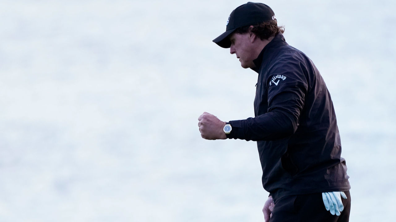 PEBBLE BEACH, CALIFORNIA - FEBRUARY 10: Phil Mickelson of the United States celebrates on the 13th green during the final round of the AT&T Pebble Beach Pro-Am at Pebble Beach Golf Links on February 10, 2019 in Pebble Beach, California.