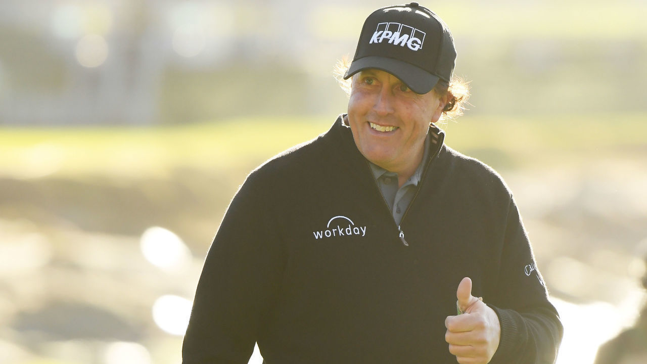 PEBBLE BEACH, CALIFORNIA - FEBRUARY 11: Phil Mickelson of the United States walks up the 18th hole during the continuation of the final round of the AT&T Pebble Beach Pro-Am at Pebble Beach Golf Links on February 11, 2019 in Pebble Beach, California.