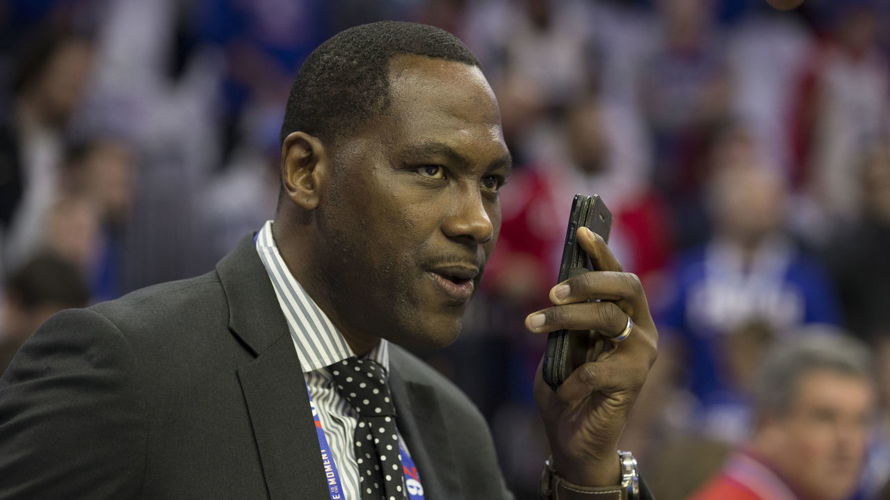 PHILADELPHIA, PA - OCTOBER 18: General Manager Elton Brand of the Philadelphia 76ers talks on the phone prior to the game against the Chicago Bulls at Wells Fargo Center on October 18, 2018 in Philadelphia, Pennsylvania.