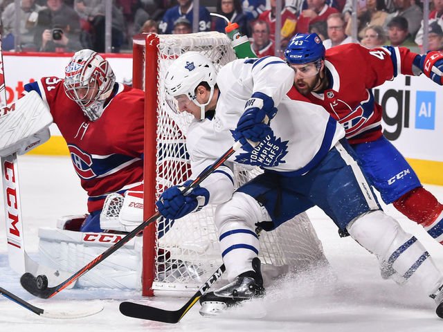 MONTREAL, QC - FEBRUARY 09: Zach Hyman #11 of the Toronto Maple Leafs wraps the puck around the net of goaltender Carey Price #31 of the Montreal Canadiens during the NHL game at the Bell Centre on February 9, 2019 in Montreal, Quebec, Canada.