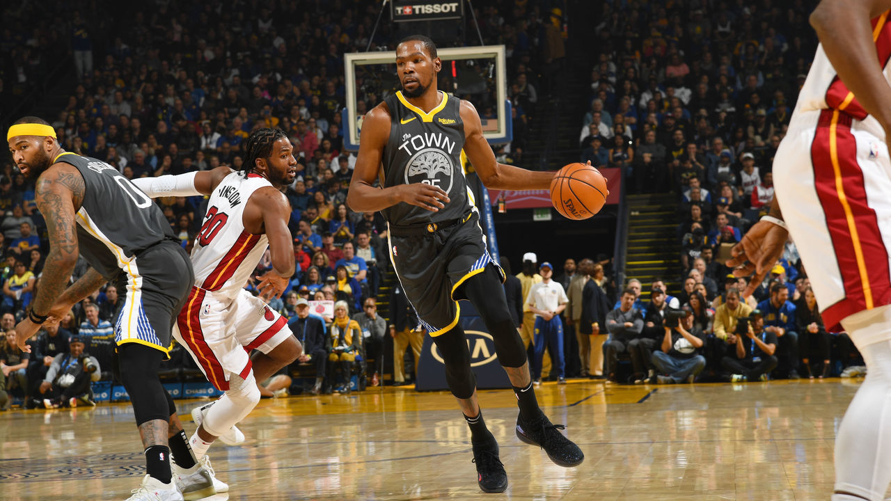 OAKLAND, CA - FEBRUARY 10: Kevin Durant #35 of the Golden State Warriors dribbles the ball during the game against the Miami Heat on February 10 at ORACLE Arena in Oakland, California. NOTE TO USER: User expressly acknowledges and agrees that, by downloading and or using this photograph, user is consenting to the terms and conditions of Getty Images License Agreement. Mandatory Copyright Notice: Copyright 2019 NBAE