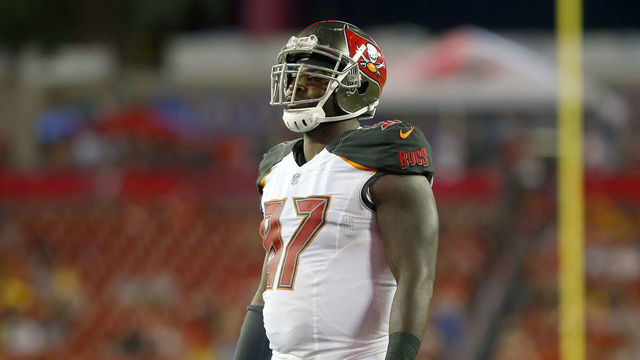 TAMPA, FL - AUG 24: Vinny Curry (97) of the Bucs looks into the offensive huddle during the preseason game between the Detroit Lions and the Tampa Bay Buccaneers on August 24, 2018 at Raymond James Stadium in Tampa, Florida.