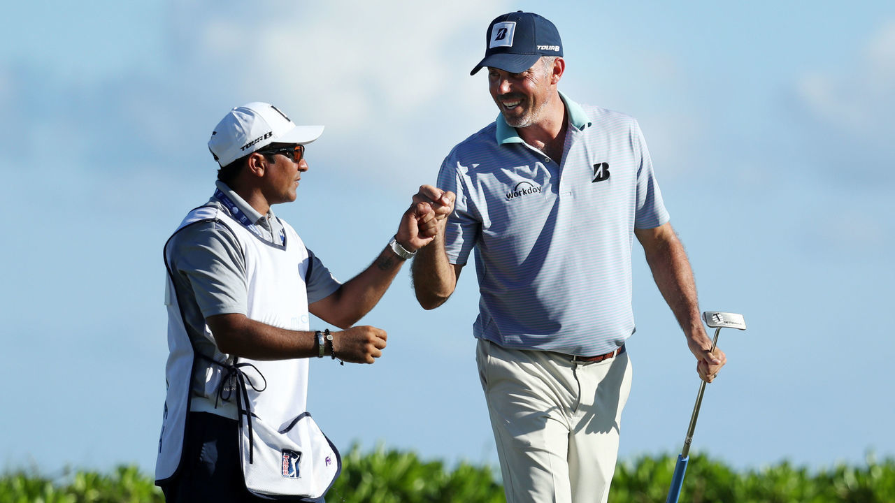 PLAYA DEL CARMEN, MEXICO - NOVEMBER 09: Matt Kuchar of the United States celebrates his birdie with his caddie on the 15th green during the second round of the Mayakoba Golf Classic at El Camaleon Mayakoba Golf Course on November 09, 2018 in Playa del Carmen, Mexico.