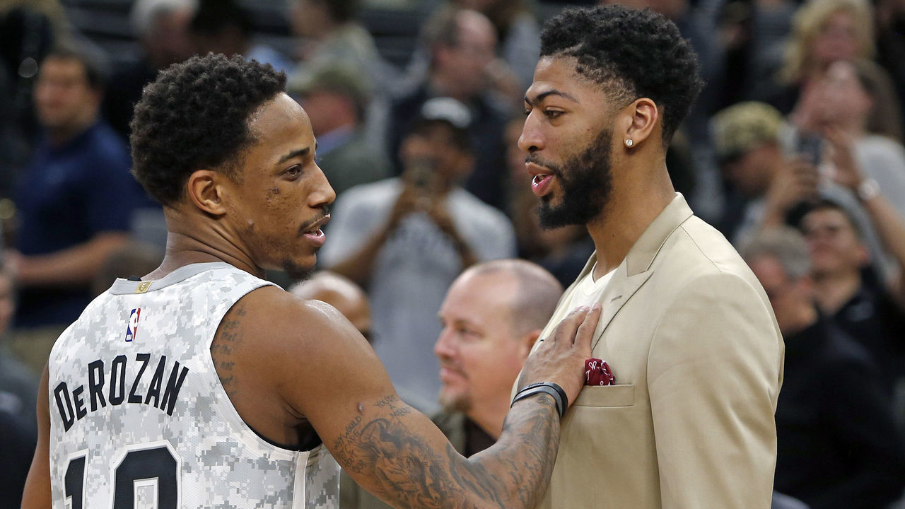 SAN ANTONIO, TX - FEBRUARY 2: DeMar DeRozan #10 of the San Antonio Spurs greets Anthony Davis #23 of the New Orleans Pelicans in street clothes at the end of the game at AT&T Center on February 2, 2019 in San Antonio, Texas. NOTE TO USER: User expressly acknowledges and agrees that , by downloading and or using this photograph, User is consenting to the terms and conditions of the Getty Images License Agreement.