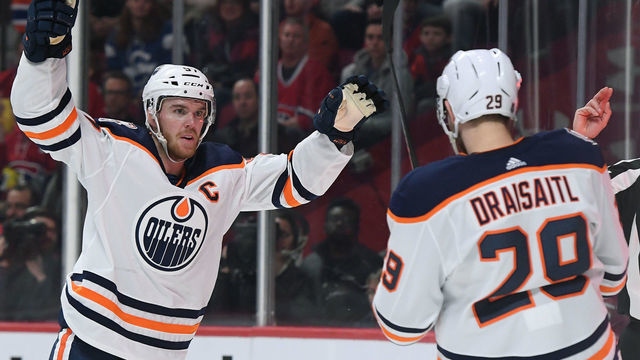 MONTREAL, QC - FEBRUARY 3: Connor McDavid #97 and Leon Draisaitl #29 of the Edmonton Oilers celebrate after scoring a goal on goaltender Carey Price #31 of the Montreal Canadiens in the NHL game at the Bell Centre on February 3, 2019 in Montreal, Quebec, Canada.