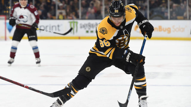 BOSTON, MA - FEBRUARY 10: David Pastrnak #88 of the Boston Bruins handles the puck against the Colorado Avalanche at the TD Garden on February 10, 2019 in Boston, Massachusetts.