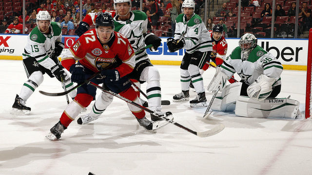 SUNRISE, FL - FEBRUARY 12: Frank Vatrano #72 of the Florida Panthers skates for possession against John Klingberg #3 of the Dallas Stars at the BB&T Center on February 12, 2019 in Sunrise, Florida.