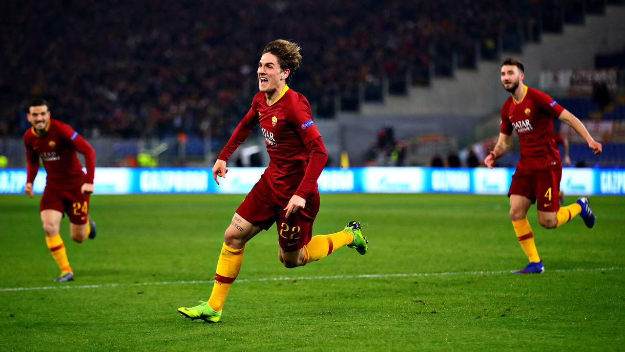 ROME, ITALY - FEBRUARY 12: Nicolo Zaniolo of AS Roma celebrates scoring his sides first goal during the UEFA Champions League Round of 16 First Leg match between AS Roma and FC Porto at Stadio Olimpico on February 12, 2019 in Rome, .