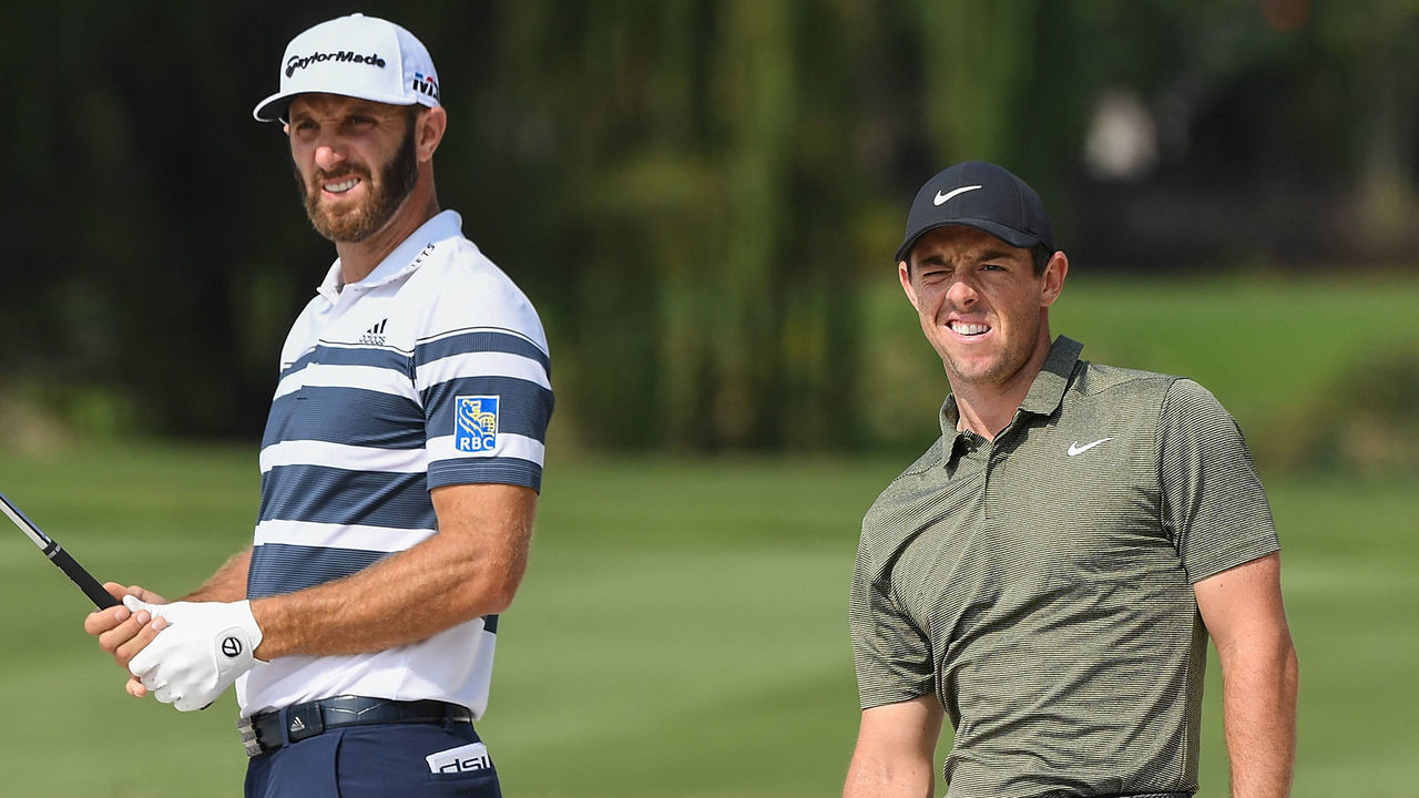 SHANGHAI, CHINA - OCTOBER 25: Dustin Johnson of the United States and Rory McIlroy of Northern Ireland play a shot on the 14th hole during the first round of the WGC - HSBC Champions at Sheshan International Golf Club on October 25, 2018 in Shanghai, China.