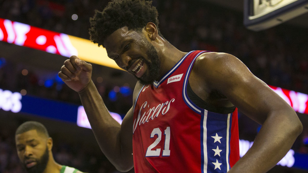 PHILADELPHIA, PA - FEBRUARY 12: Joel Embiid #21 of the Philadelphia 76ers reacts in front of Marcus Morris #13 of the Boston Celtics after making a basket and getting fouled in the fourth quarter at the Wells Fargo Center on February 12, 2019 in Philadelphia, Pennsylvania. The Celtics defeated the 76ers 112-109.