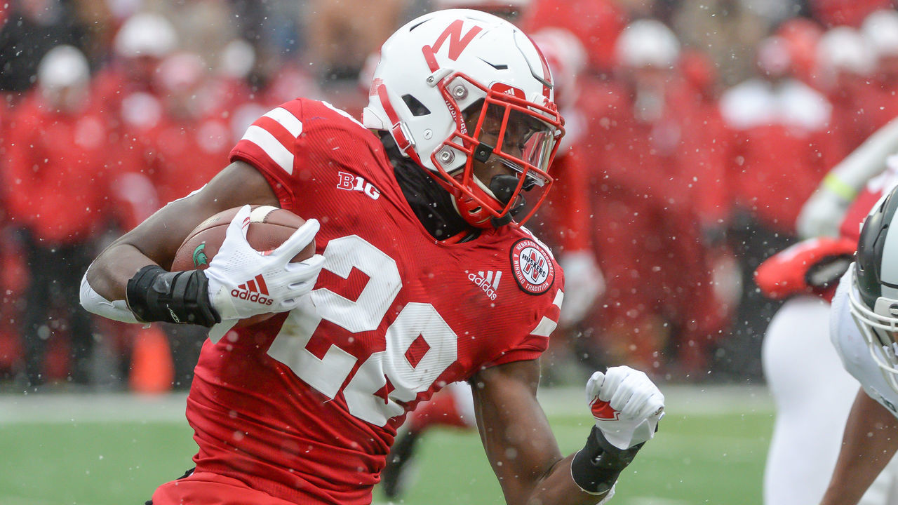 LINCOLN, NE - NOVEMBER 17: Running back Maurice Washington #28 of the Nebraska Cornhuskers runs against the Michigan State Spartans at Memorial Stadium on November 17, 2018 in Lincoln, Nebraska.