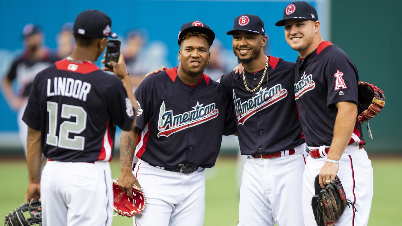 WASHINGTON, DC - JULY 16: Francisco Lindor #12 of the Cleveland Indians takes a photograph of Jose Ramirez #11 of the Cleveland Indians, Mookie Betts #50 of the Boston Red Sox, and Mike Trout #27 of the Los Angeles Angels of Anaheim during All-Star Workout Day at Nationals Park Monday, July 16, 2018 in Washington, DC.