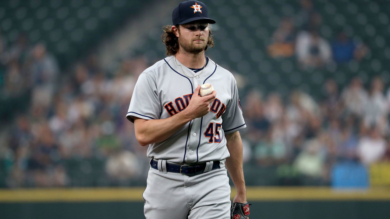 SEATTLE, WA - AUGUST 20: Gerrit Cole #45 of the Houston Astros reacts after walking Kyle Seager #15 of the Seattle Mariners in the first inning during their game at Safeco Field on August 20, 2018 in Seattle, Washington.