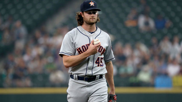 SEATTLE, WA - AUGUST 20: Gerrit Cole #45 of the Houston Astros reacts after walking Kyle Seager #15 of the Seattle Mariners in the first inning during their game at Safeco Field on August 20, 2018 in Seattle, Washington.