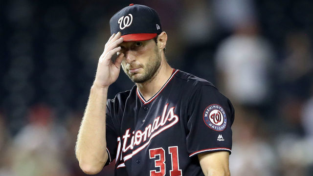 WASHINGTON, DC - SEPTEMBER 25: Starting pitcher Max Scherzer #31 of the Washington Nationals acknowledges the crowd after recording his 300th strikeout for the year against the Miami Marlins for the second out of the seventh inning at Nationals Park on September 25, 2018 in Washington, DC.