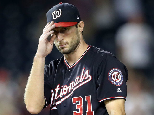 WASHINGTON, DC - SEPTEMBER 25: Starting pitcher Max Scherzer #31 of the Washington Nationals acknowledges the crowd after recording his 300th strikeout for the year against the Miami Marlins for the second out of the seventh inning at Nationals Park on September 25, 2018 in Washington, DC.