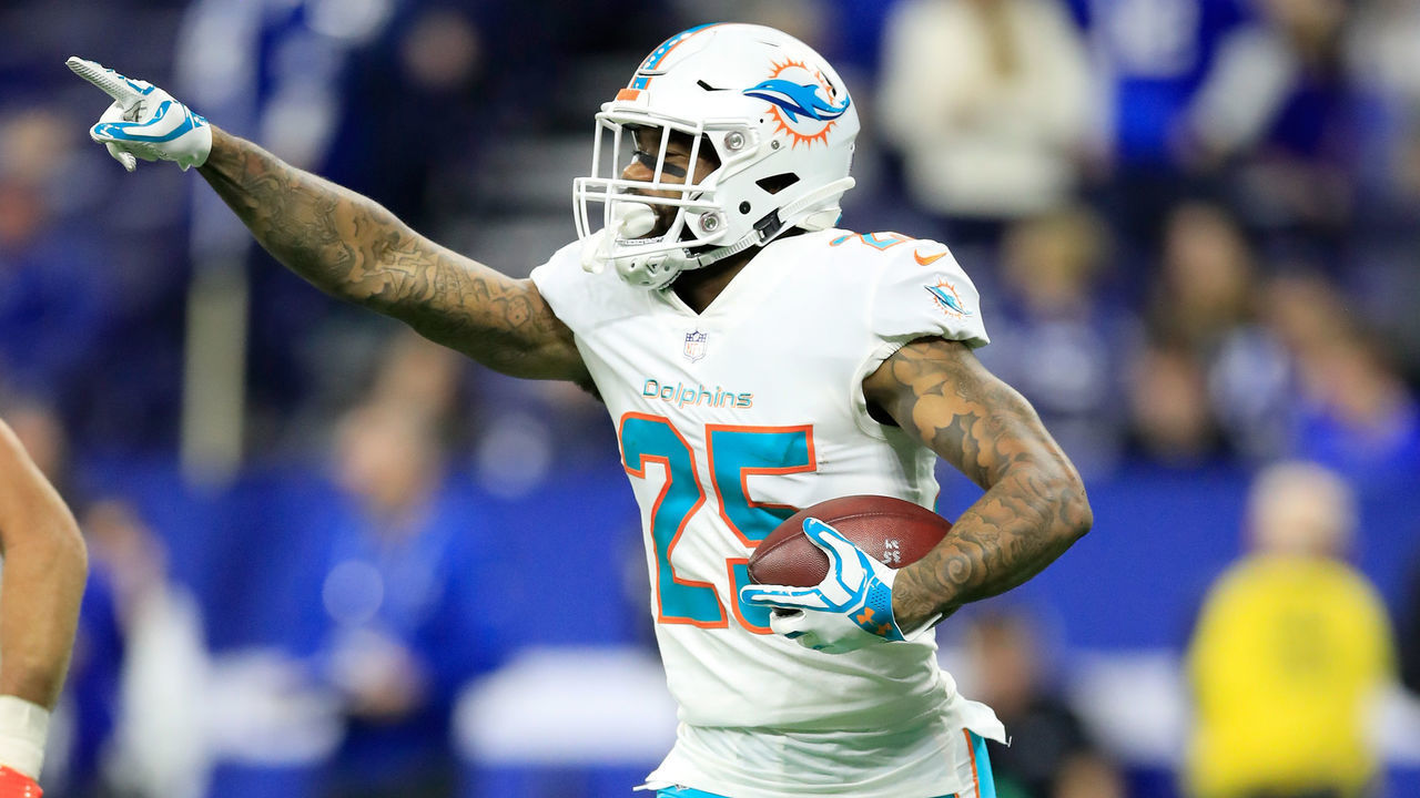 INDIANAPOLIS, IN - NOVEMBER 25: Xavien Howard #25 of the Miami Dolphins celebrates after intercepting a pass in the final minute of the first half against the Indianapolis Colts at Lucas Oil Stadium on November 25, 2018 in Indianapolis, Indiana.