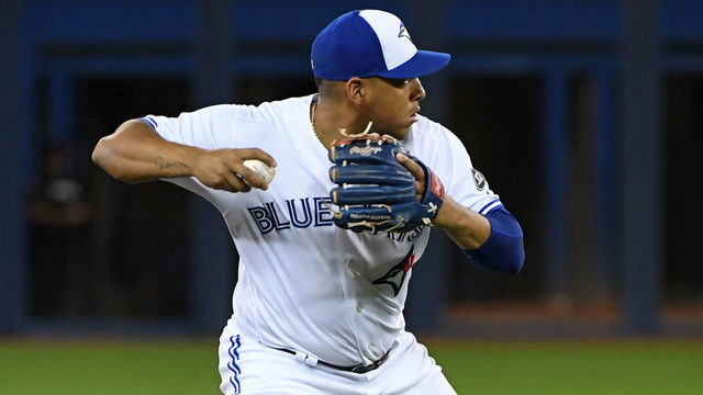 TORONTO, ON - SEPTEMBER 25: Toronto Blue Jays Infield Yangervis Solarte (26) fields a ground ball during the regular season MLB game between the Houston Astros and Toronto Blue Jays on September 25, 2018, at Rogers Centre in Toronto, ON.