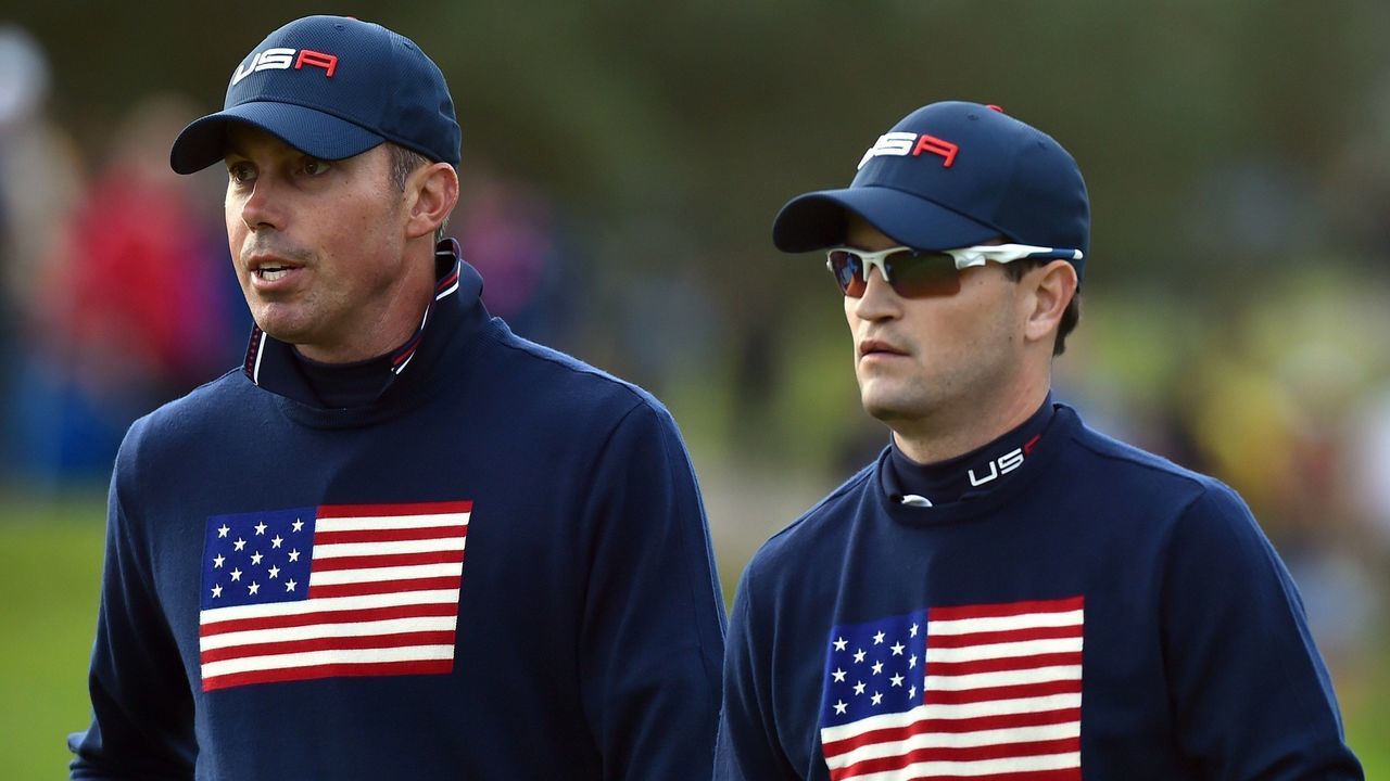 Matt Kuchar (L) and Zack Johnson of Team US leave the 15th green during Saturday's foursomes matches on the second day of the Ryder Cup golf tournament at the Gleneagles Hotel in Gleneagles, Scotland, on September 27, 2014. AFP PHOTO/BEN STANSALL