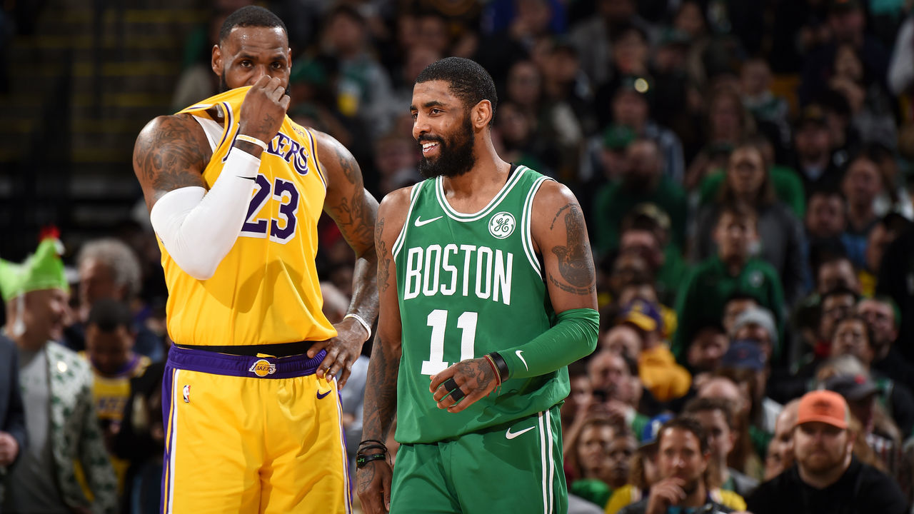 BOSTON, MA - FEBRUARY 7: LeBron James #23 of the Los Angeles Lakers and Kyrie Irving #11 of the Boston Celtics talk during the game on February 7, 2019 at the TD Garden in Boston, Massachusetts. NOTE TO USER: User expressly acknowledges and agrees that, by downloading and/or using this photograph, user is consenting to the terms and conditions of the Getty Images License Agreement. Mandatory Copyright Notice: Copyright 2019 NBAE