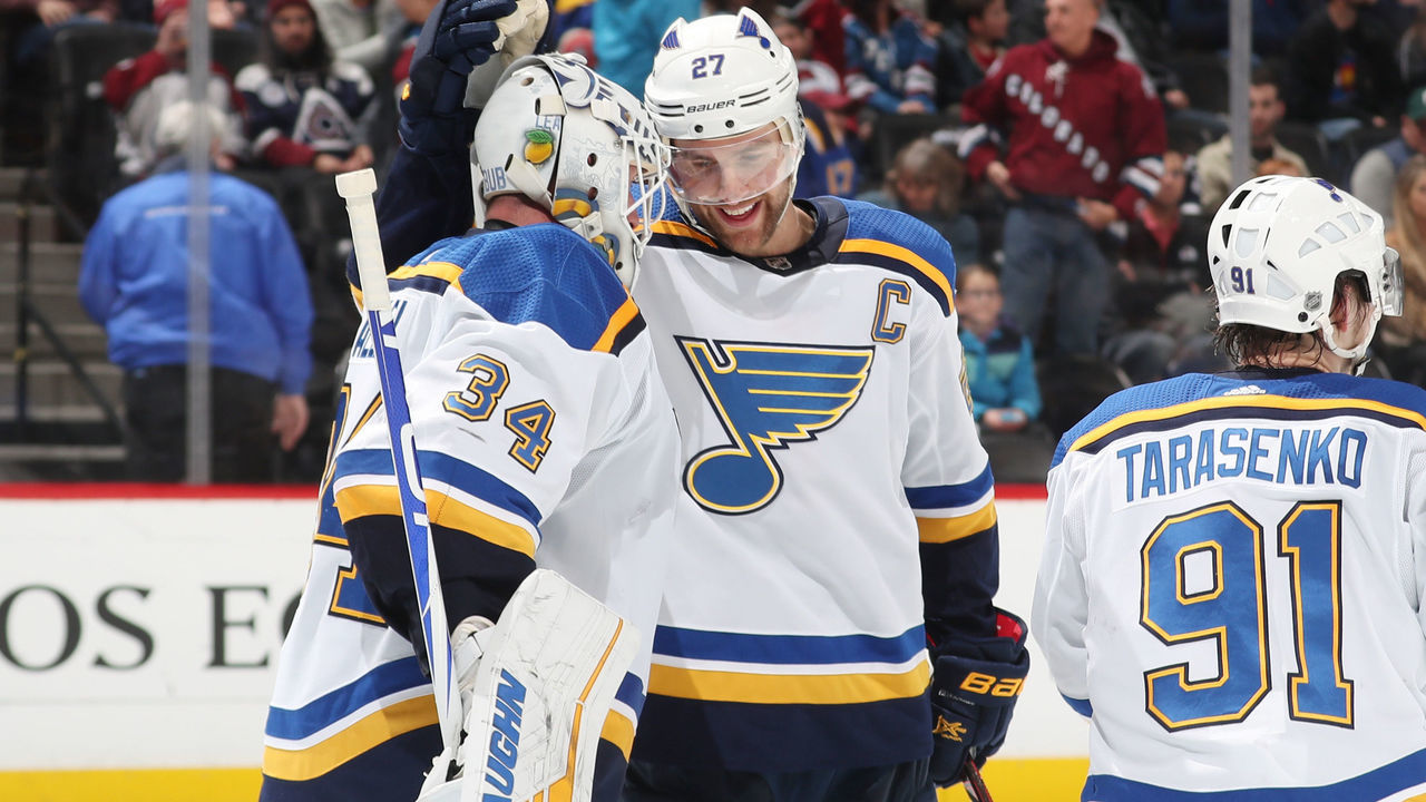 DENVER, CO - FEBRUARY 16: Alex Pietrangelo #27 of the St. Louis Blues congratulates teammate goaltender Jake Allen #34 after a shutout against the Colorado Avalanche at the Pepsi Center on February 16, 2019 in Denver, Colorado. The Blues defeated the Avalanche 3-0.