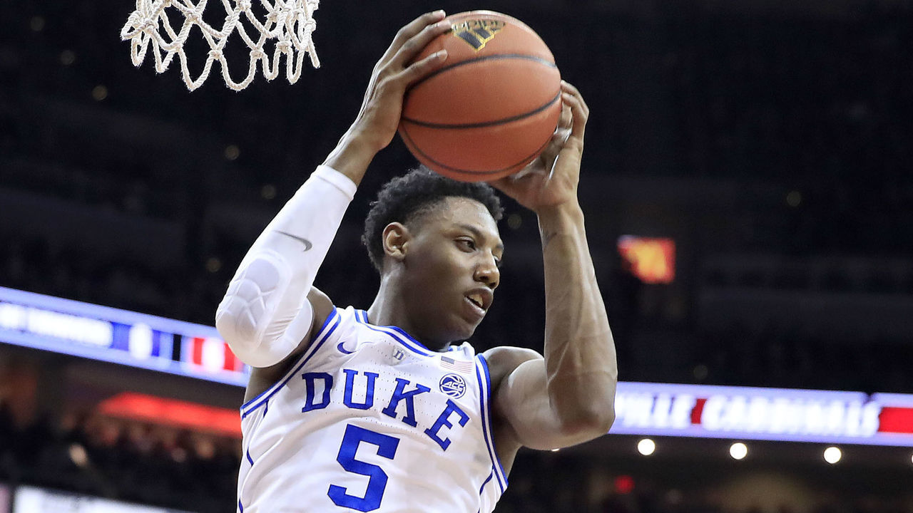 LOUISVILLE, KENTUCKY - FEBRUARY 12: RJ Barrett #5 of the Duke Blue Devils grabs a rebound against the Louisville Cardinals at KFC YUM! Center on February 12, 2019 in Louisville, Kentucky.