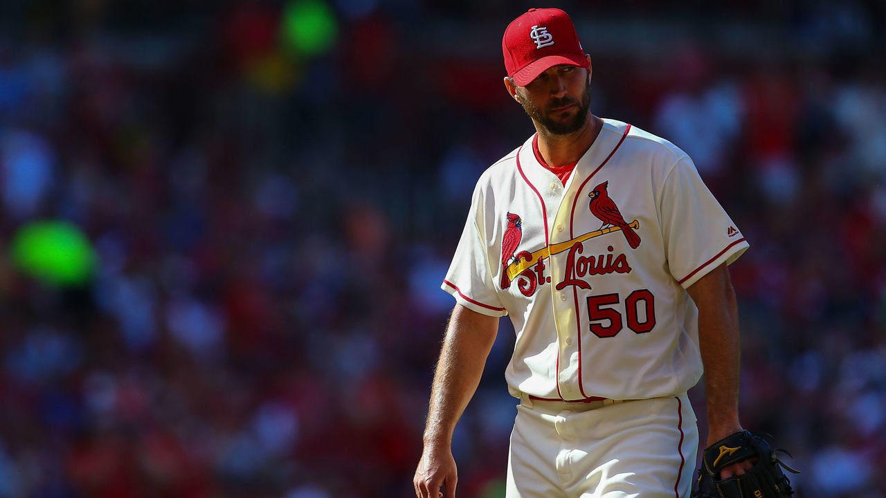 ST. LOUIS, MO - JULY 8: Adam Wainwright #50 of the St. Louis Cardinals returns to the dugout after being pulled from the game in the seventh inning at Busch Stadium on July 8, 2017 in St. Louis, Missouri.